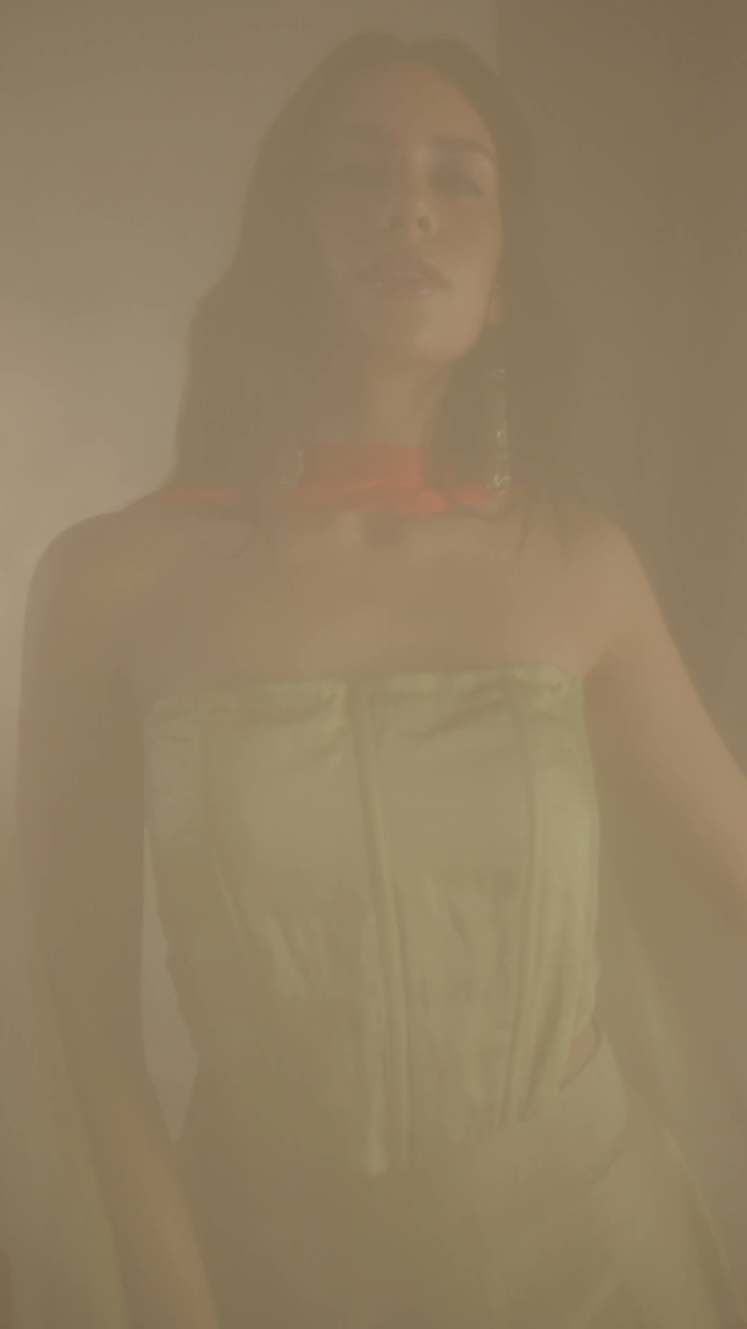 A customer wearing a piece from the collection